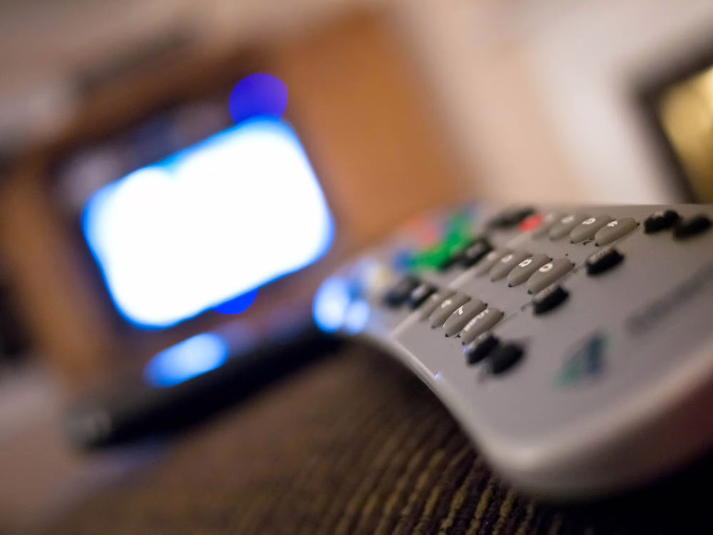 Television remote control used for media playback and device setup